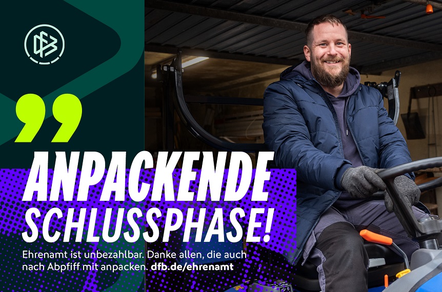 Image description: The image shows a person sitting on a small vehicle or piece of equipment, presumably a ride-on lawnmower or similar. The person is wearing a thick, blue winter jacket and gloves. On the left of the picture is a graphic area with the logo of the German Football Association (DFB) and large text: "ANPACKENDE SCHLUSSPHASE! Volunteering is priceless. Thank you to everyone who lends a hand even after the final whistle. dfb.de/ehrenamt".
